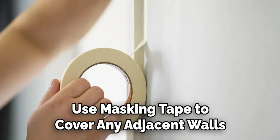 Use Masking Tape to Cover Any Adjacent Walls