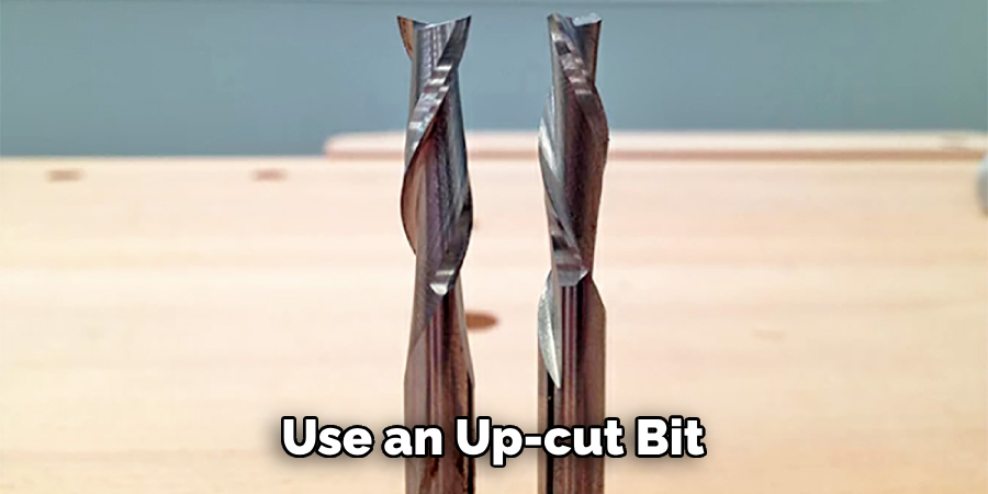 Use an Up-cut Bit