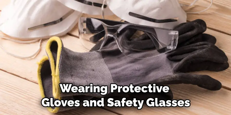 Wearing Protective Gloves and Safety Glasses