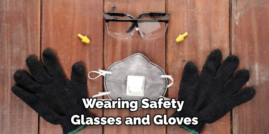 Wearing Safety Glasses and Gloves