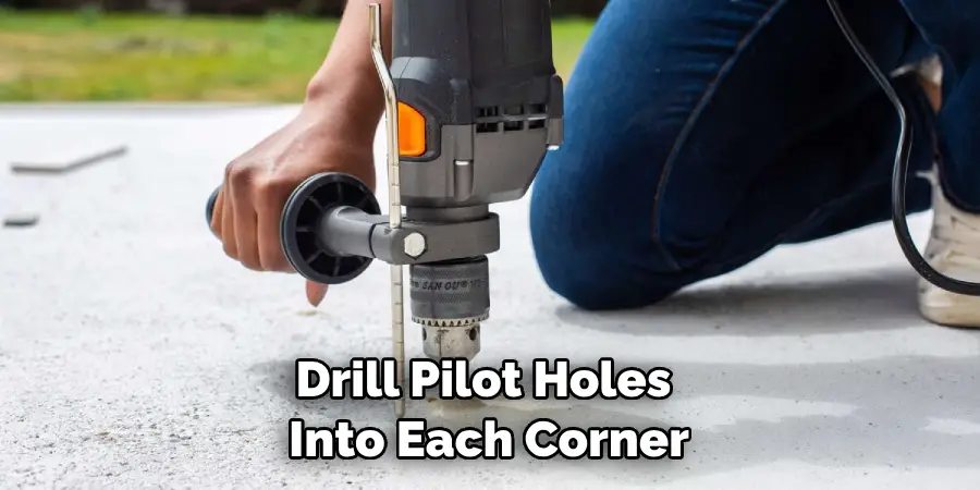 Drill Pilot Holes Into Each Corner