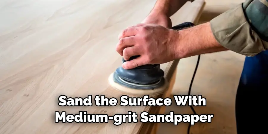 Sand the Surface With Medium-grit Sandpaper