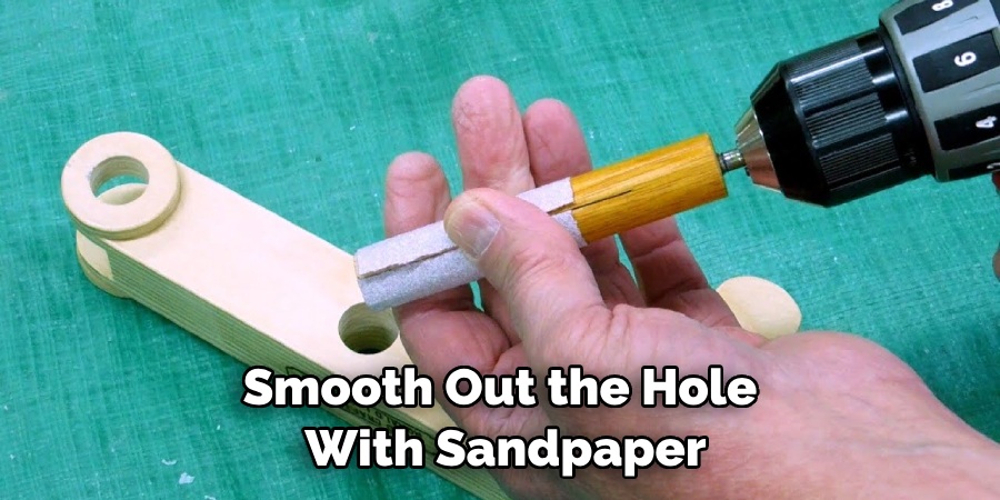 Smooth Out the Hole With Sandpaper