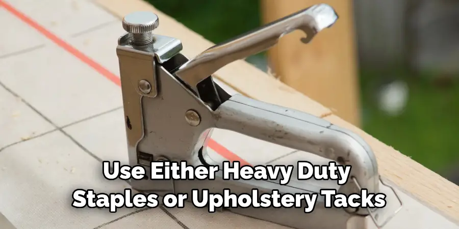 Use Either Heavy Duty Staples or Upholstery Tacks