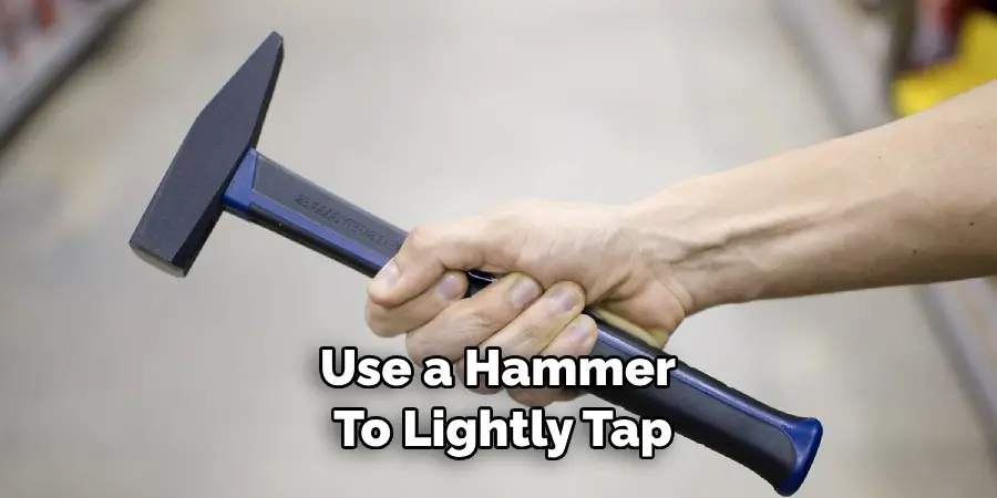 Use a Hammer to Lightly Tap