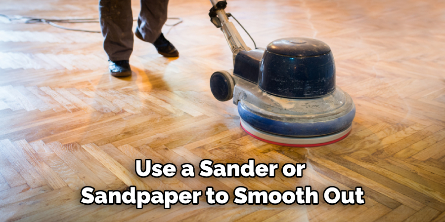 Use a Sander or Sandpaper to Smooth Out