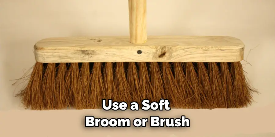 Use a Soft Broom or Brush