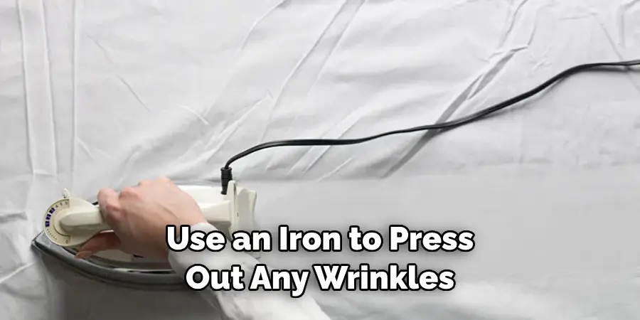 Use an Iron to Press Out Any Wrinkles 
