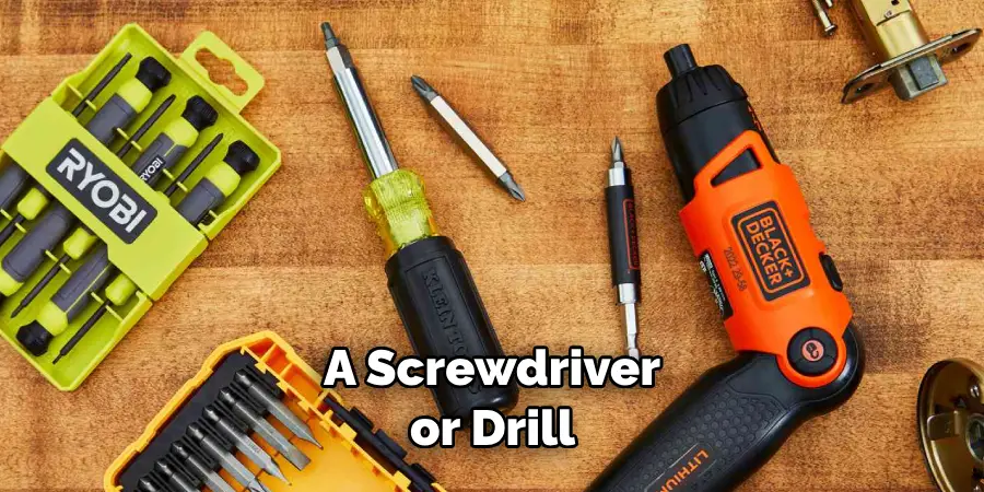 A Screwdriver or Drill 