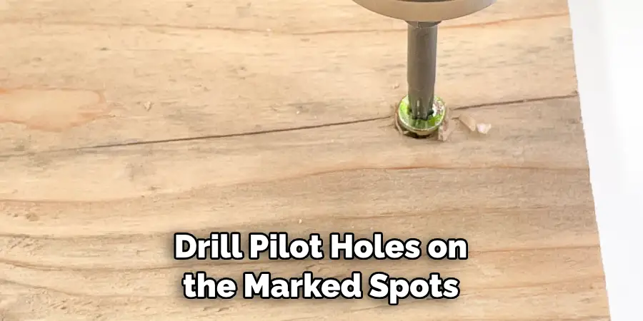 Drill Pilot Holes on the Marked Spots