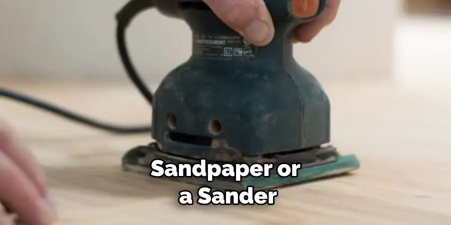 Sandpaper or a Sander