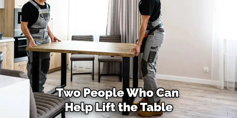 Two People Who Can Help Lift the Table