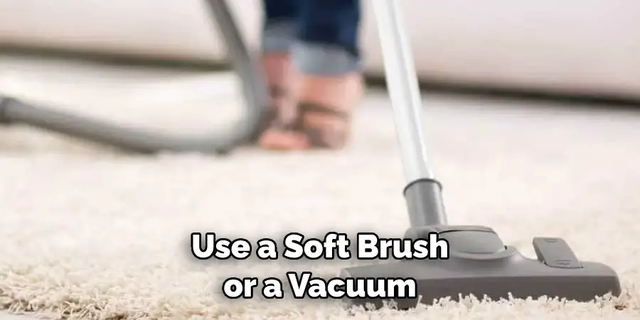 Use a Soft Brush or a Vacuum