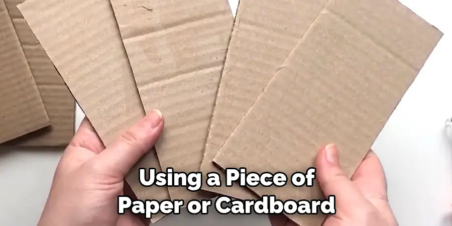  Using a Piece of Paper or Cardboard