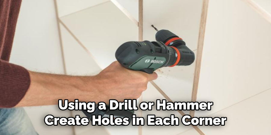 Using a Drill or Hammer Create Holes in Each Corner