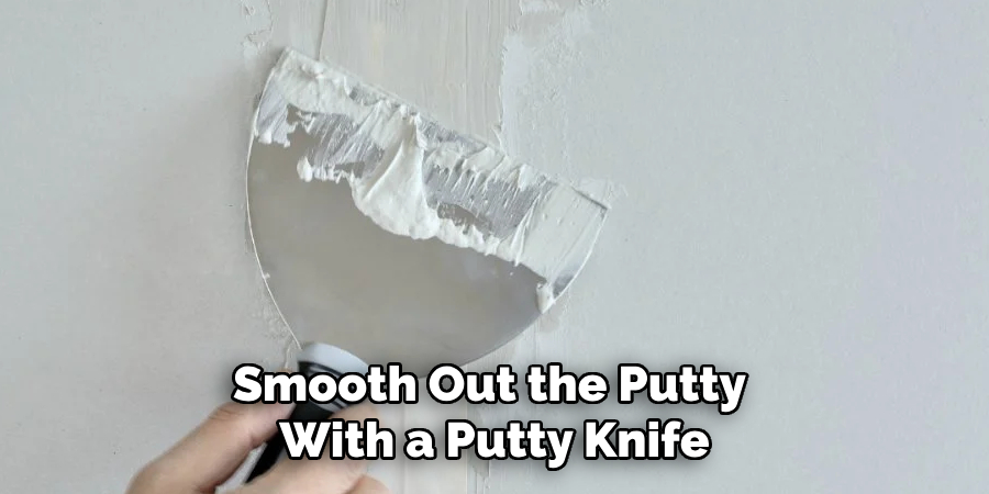 Smooth Out the Putty With a Putty Knife