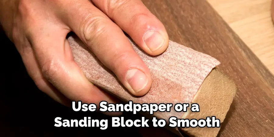 Use Sandpaper or a Sanding Block to Smooth