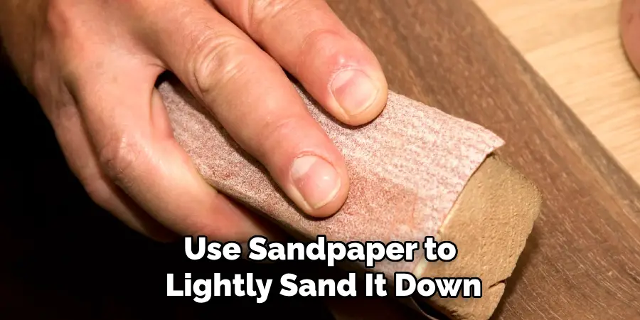 Use Sandpaper to Lightly Sand It Down