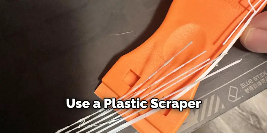 Use a Plastic Scraper