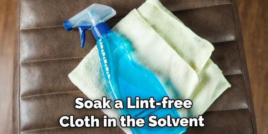 Soak a Lint-free Cloth in the Solvent 