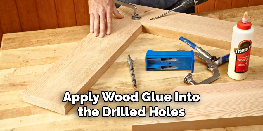 Apply Wood Glue Into the Drilled Holes