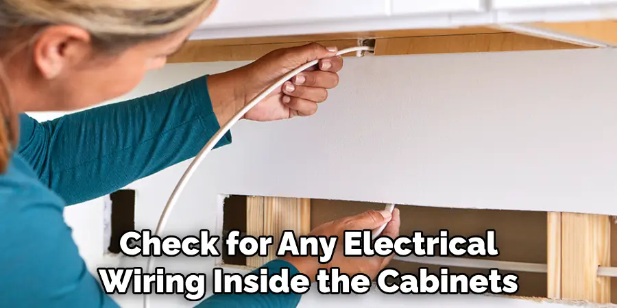 Check for Any Electrical Wiring Inside the Cabinets