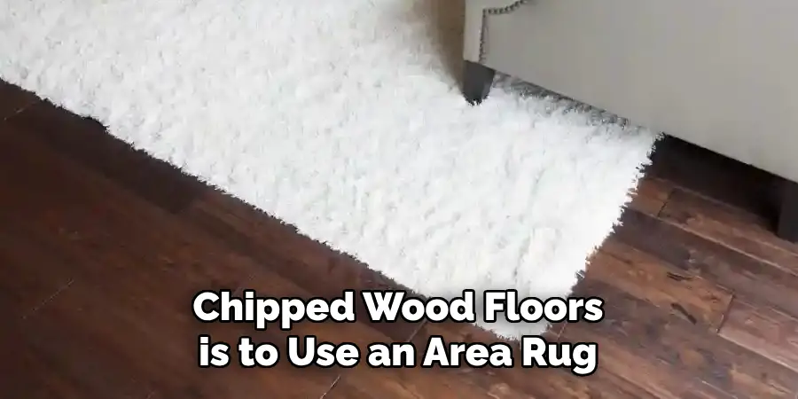 Chipped Wood Floors is to Use an Area Rug