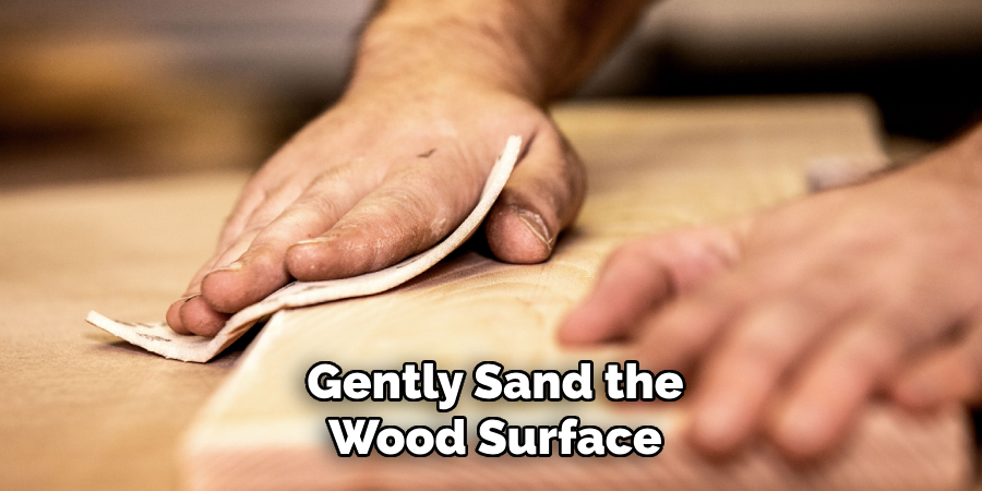 Gently Sand the Wood Surface