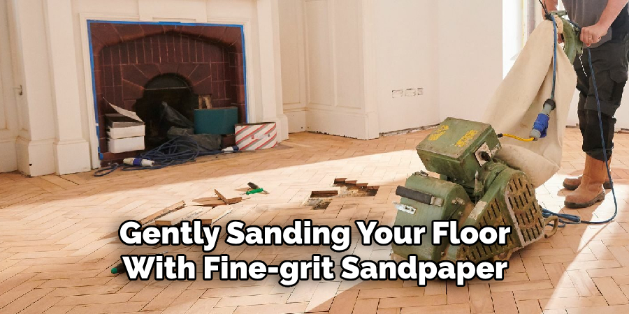 Gently Sanding Your Floor With Fine-grit Sandpaper