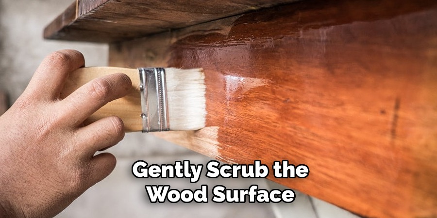 Gently Scrub the Wood Surface