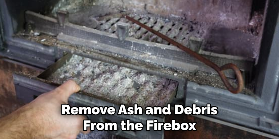 Remove Ash and Debris From the Firebox