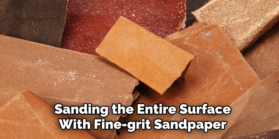 Sanding the Entire Surface With Fine-grit Sandpaper