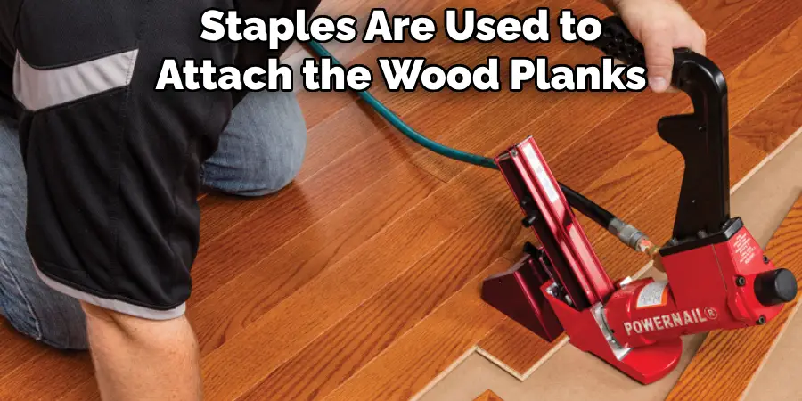 Staples Are Used to Attach the Wood Planks