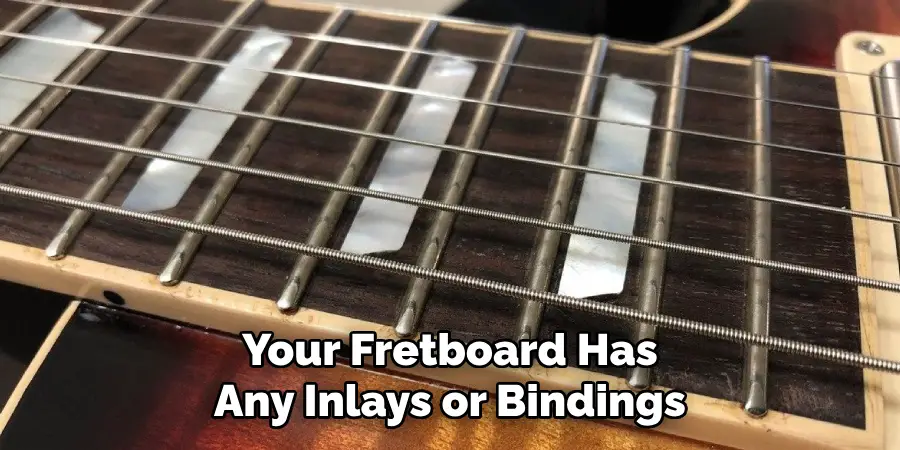 Your Fretboard Has Any Inlays or Bindings