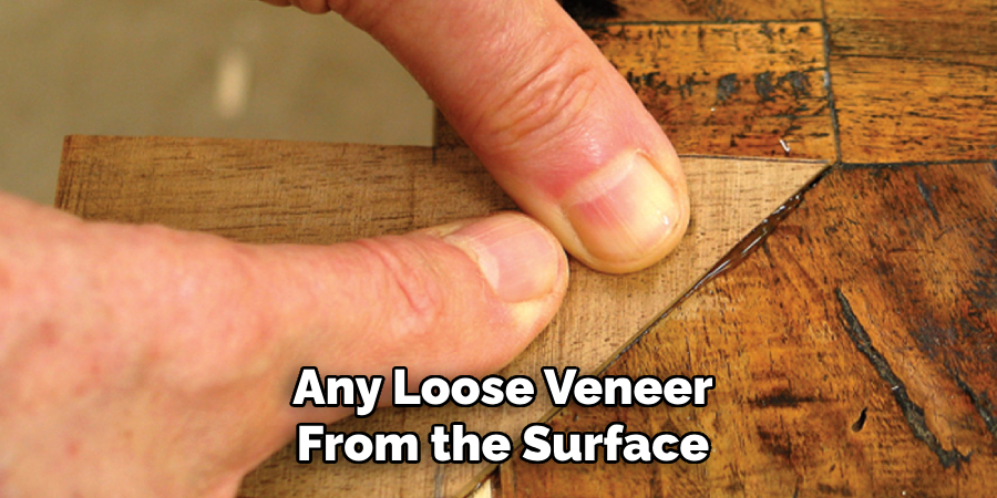 Any Loose Veneer From the Surface