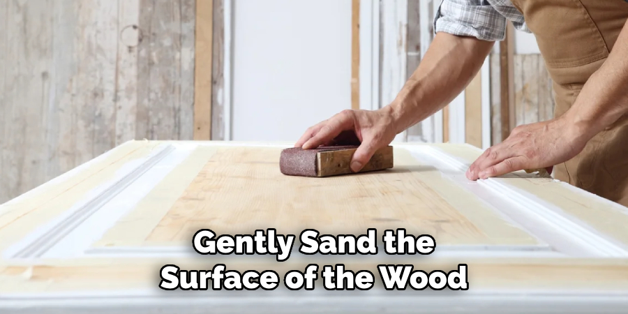 Gently Sand the Surface of the Wood