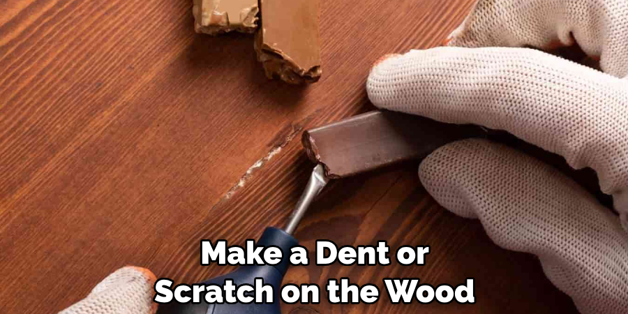 Make a Dent or Scratch on the Wood