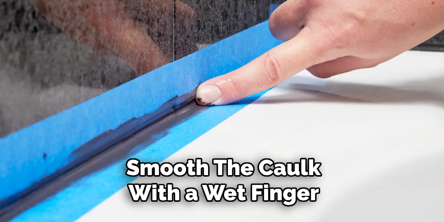 Smooth the Caulk With a Wet Finger 