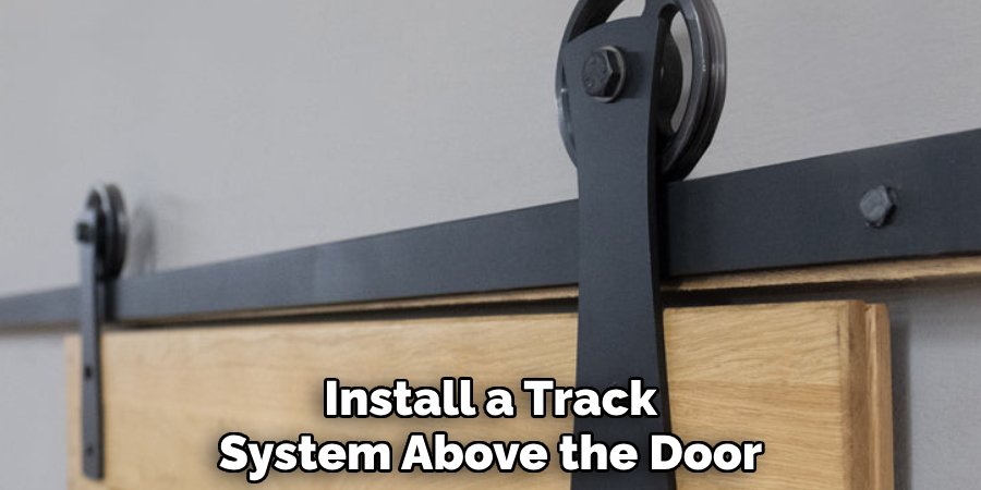 Install a Track 
System Above the Door