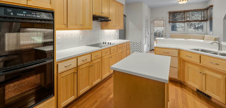 How to Lighten Dark Cabinets Without Painting | Helpful Examples